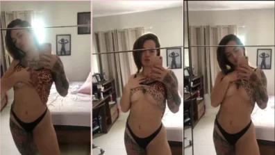 Segunda Face de blusa oncinha mostrando o corpo