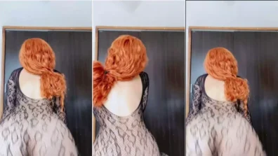 Ruiva gostosa Maria Bartola de maiô preto se mostrando