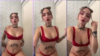 Mia maquiada loira de lingerie vermelha