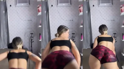 Gatinha descendo até o chão, rebolando sensualmente