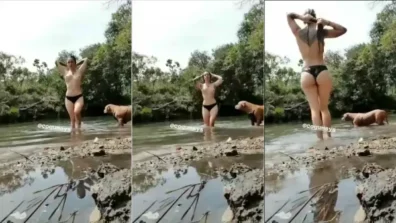 Cogumays sem sutiã tomando banho no lago