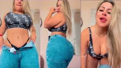 Juli Figueiró abaixando a calça