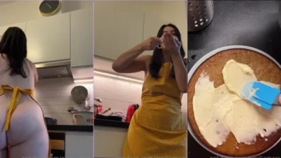 Emilia Mars se exibindo enquanto faz um bolo