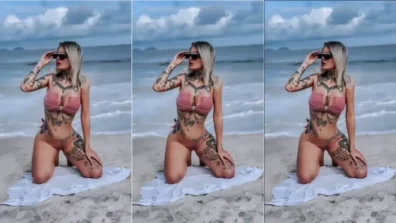Giovana Lepore se exibindo na praia