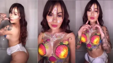 Rabuda Cintia Cossio tirando a roupa